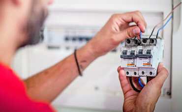 Electrician Changing Electrical Panel